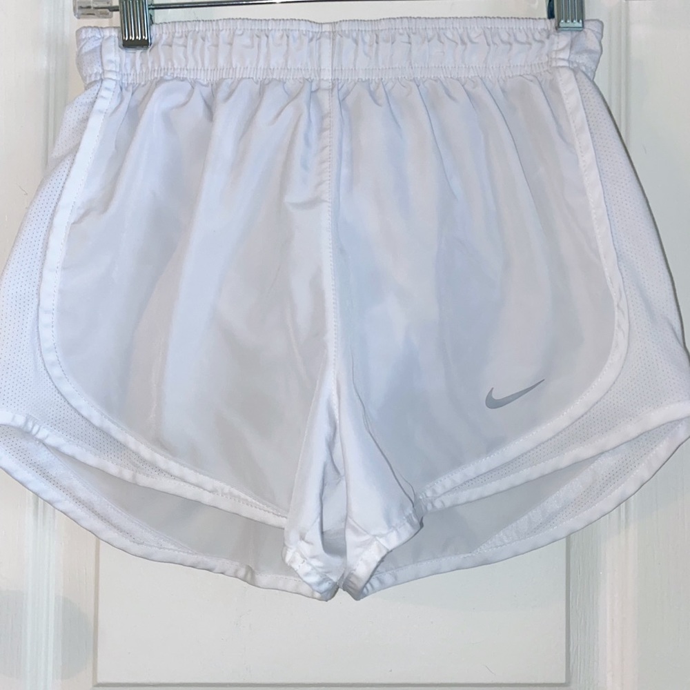 White Nike shorts